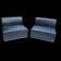 Pair of vintage black leather easy chairs