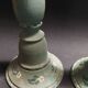 Paire de bougeoirs vintage en bois peint