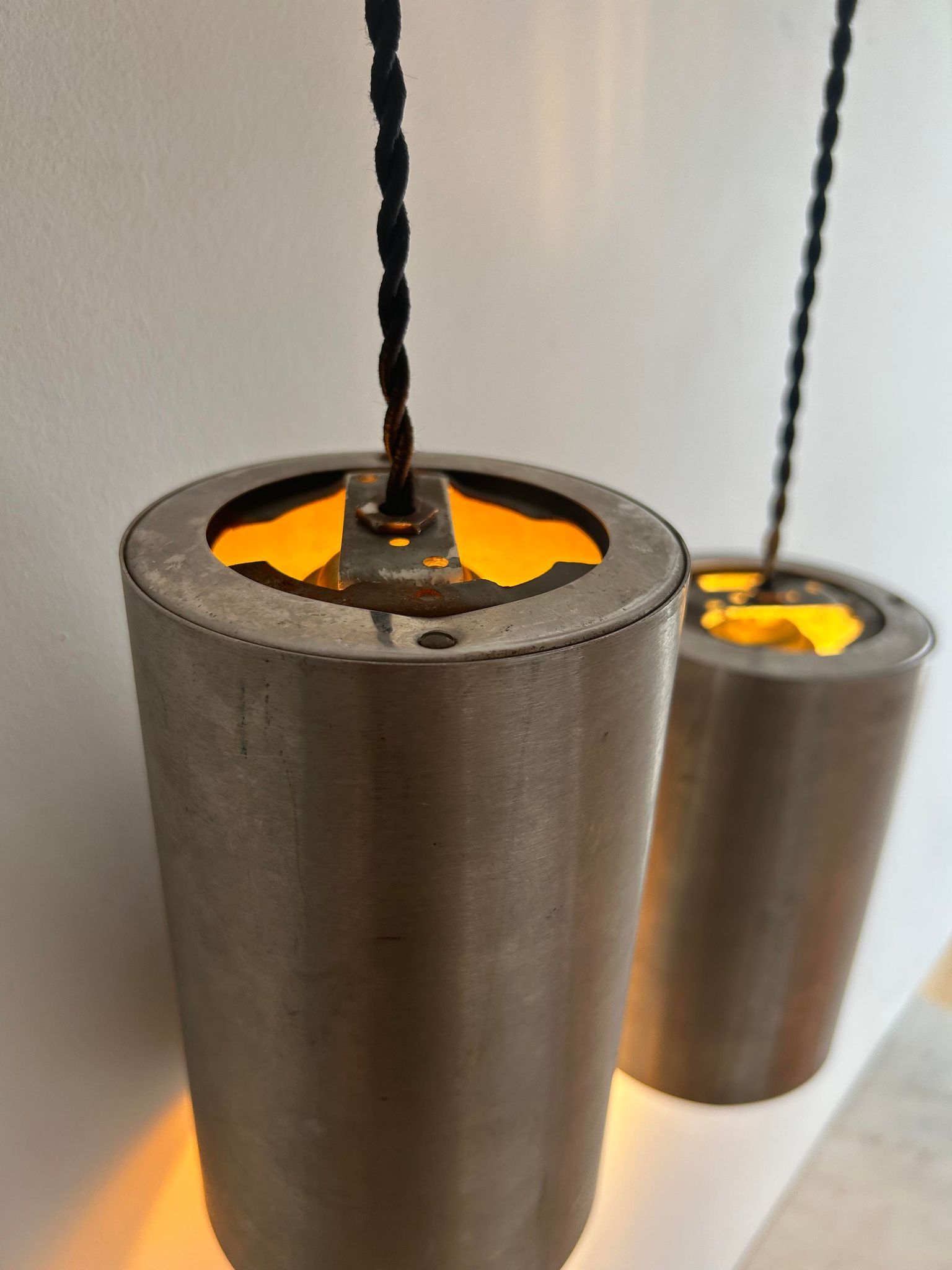 Pair of vintage brushed metal pendant lamps, France 1960