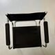 Chrome and black leather armchair