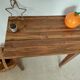 Small antique solid wood table in chic country style with a drawer.