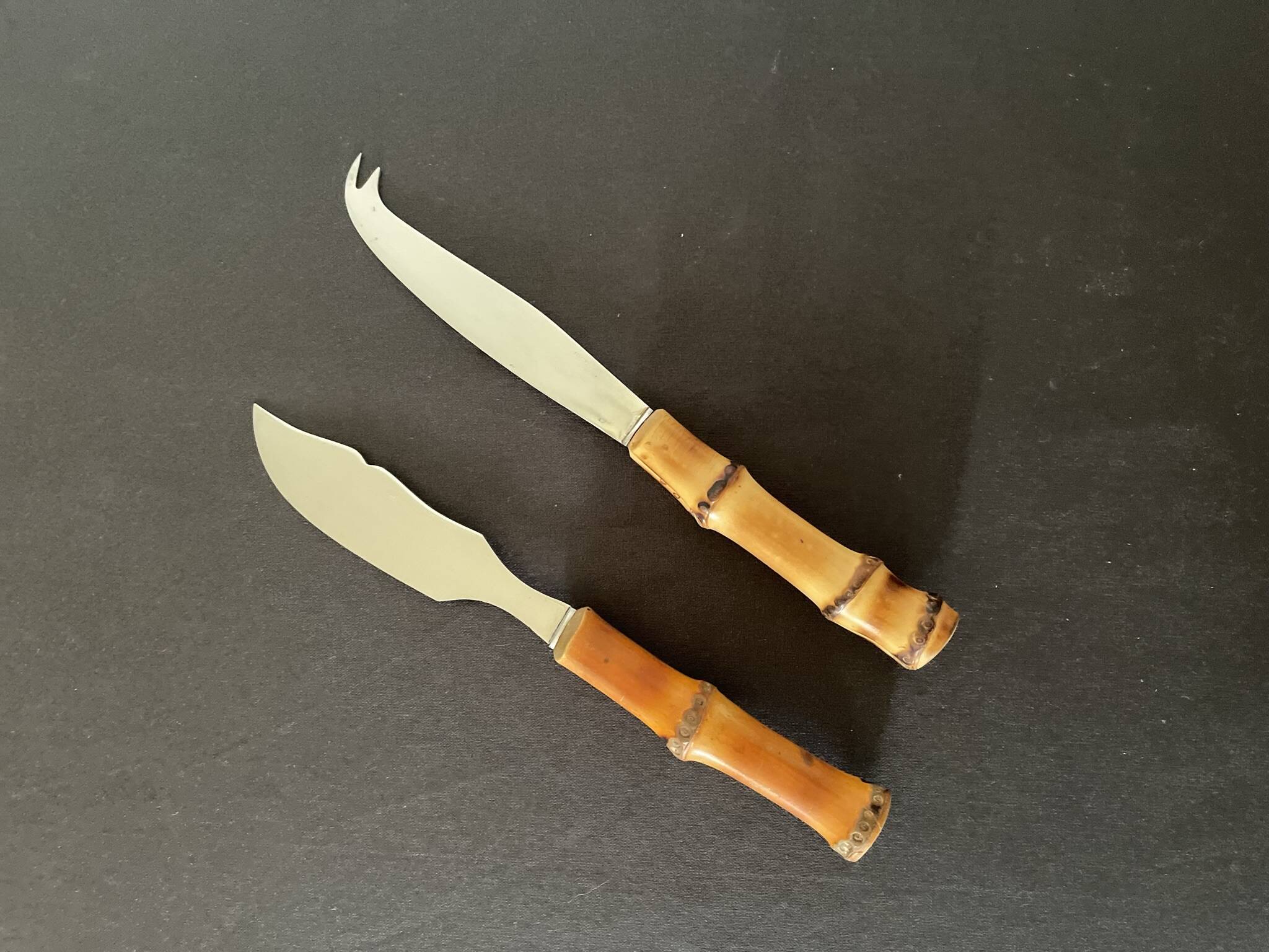 Bamboo handle cheese knives.