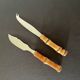 Bamboo handle cheese knives.