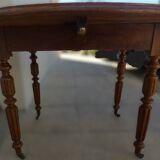 Antique round table with shutters in walnut wood on casters