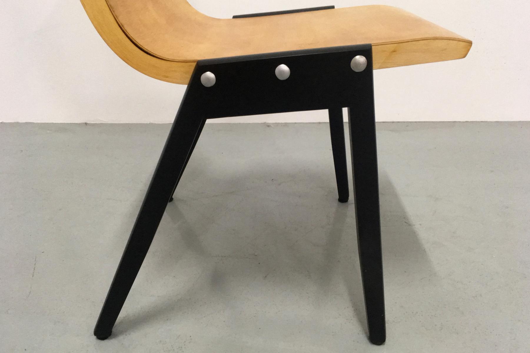 Set de 4 chaises empilables par Roland Rainer