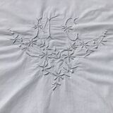 MC embroidered pillowcase with flower detailing and crocheted edge
