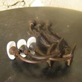 Trio of vintage coat hooks.