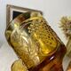 Six amber-colored stemmed glasses