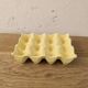 Vintage yellow ceramic egg holder
