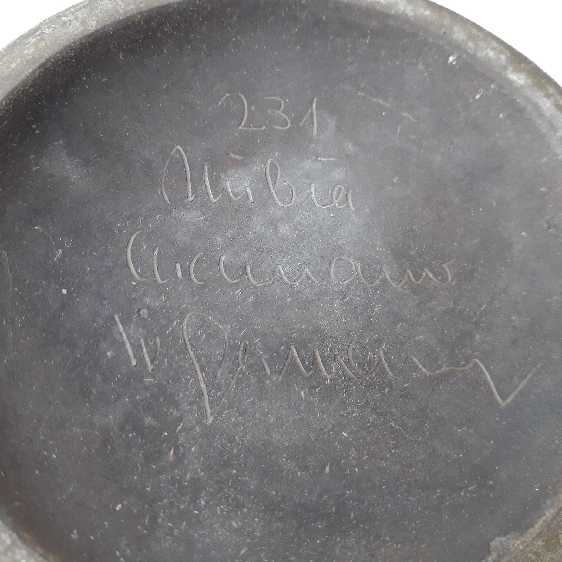 Ceramic candlestick signed