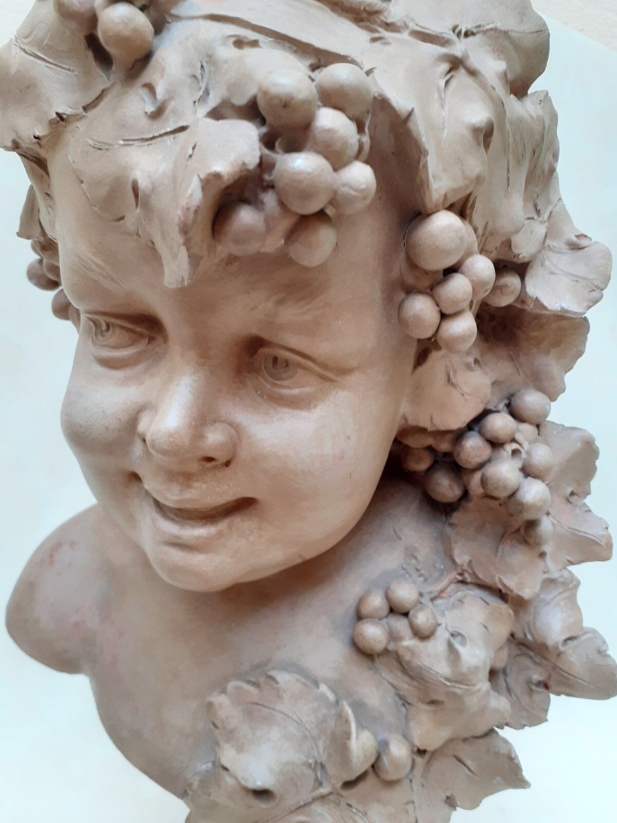 Buste de Bacchus enfant en terre cuite