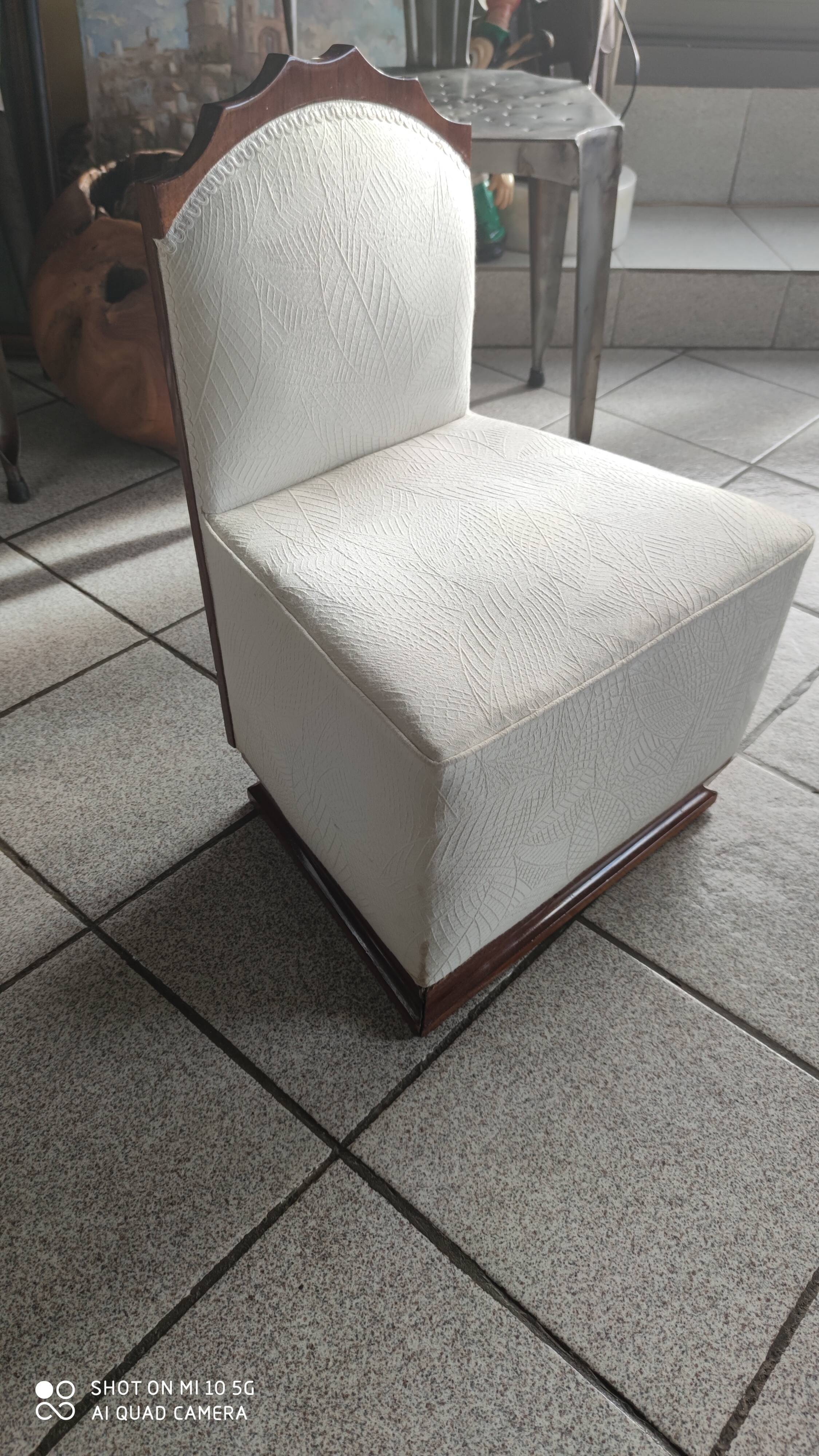 Charming decorative arts period armchair in solid walnut