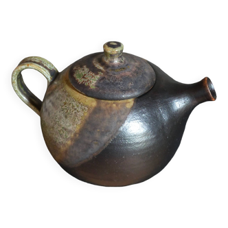 Vintage enameled stoneware potter's teapot