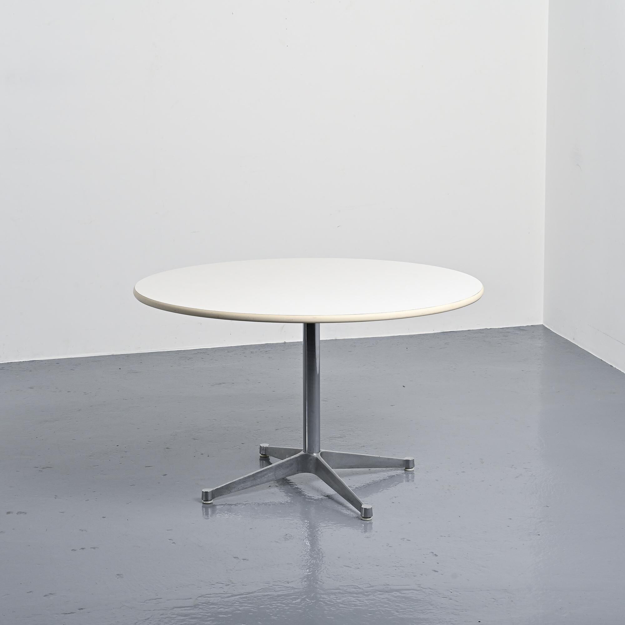 Round table by Charles and Ray Eames for Herman Miller, circa 1970.