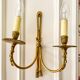 Wall light in solid brass in Empire / Neoclassical style.