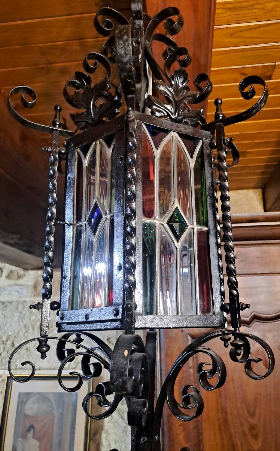Wrought iron lantern with colored stained glass
