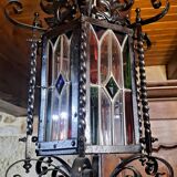 Wrought iron lantern with colored stained glass