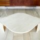 Table basse Roche Bobois forme œil en travertin 1970/80