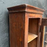 Old narrow wooden showcase.