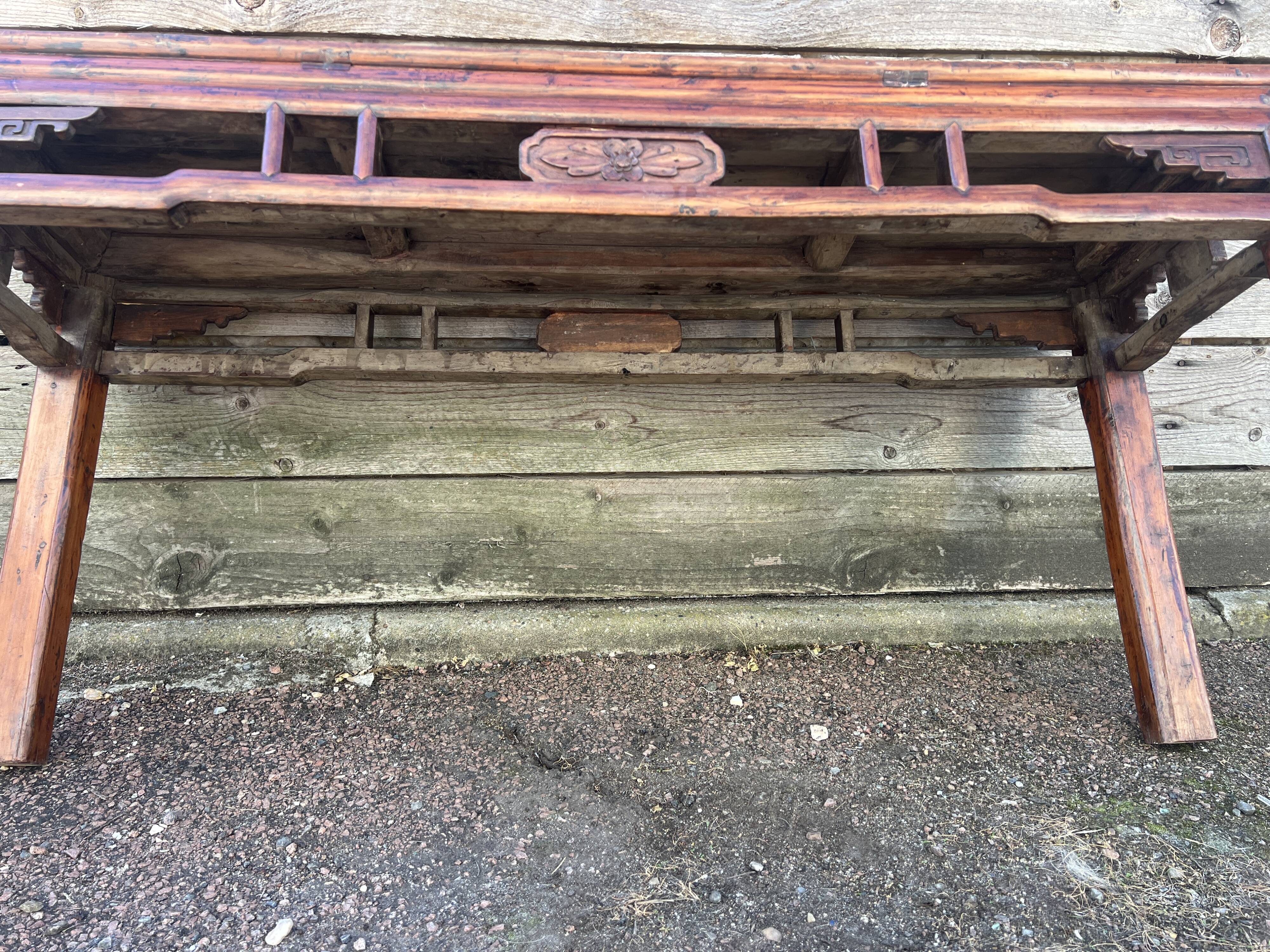 Asian low console in natural wood