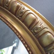 Antique mirror in wood and gilded stucco