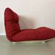 Vintage red shell lounge chairs from the 70s mid-century retro.