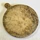 Old large round pizza cutting board