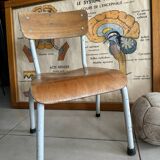 Old wooden and metal children's school chair