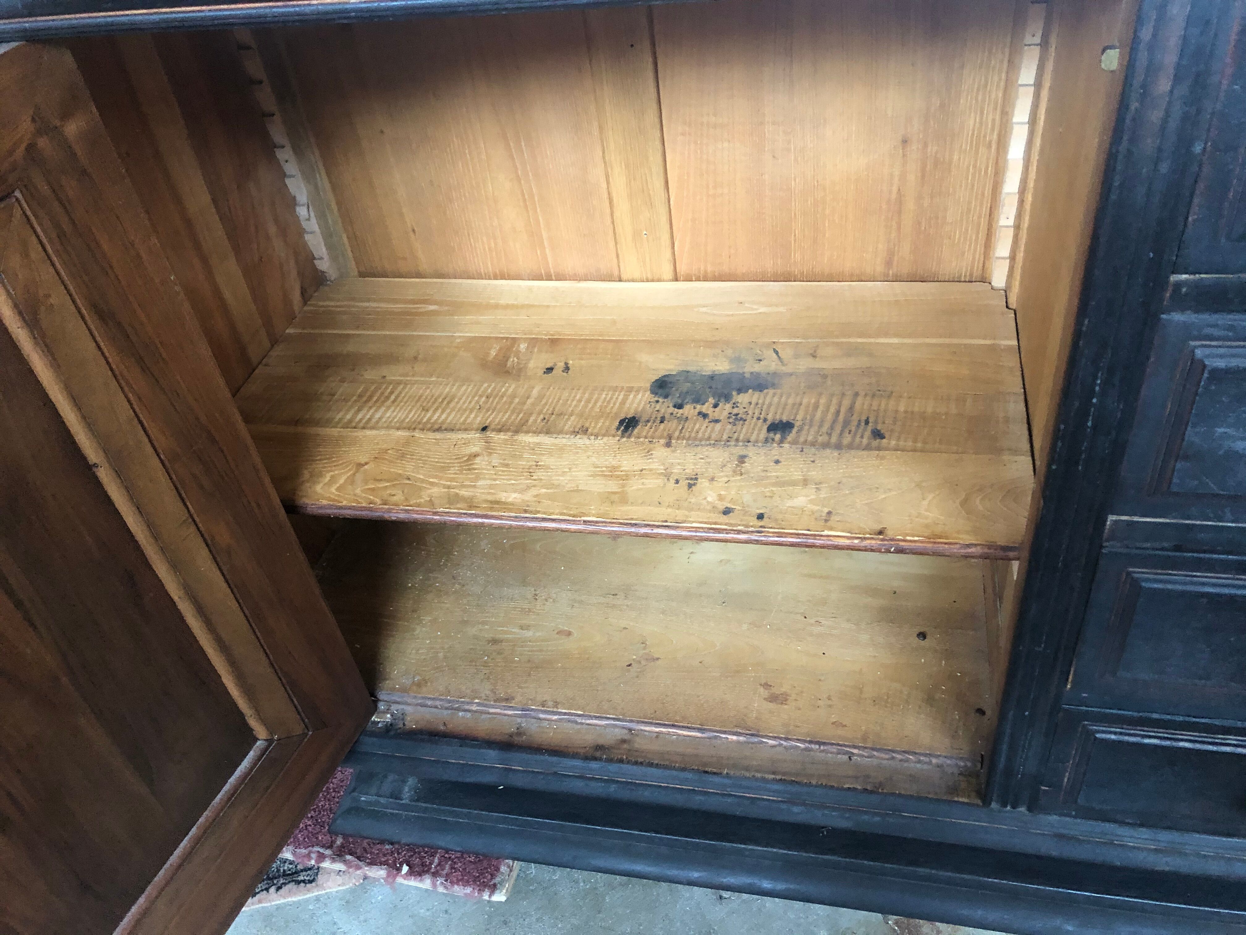 Blackened wooden sideboard of the 1950s
