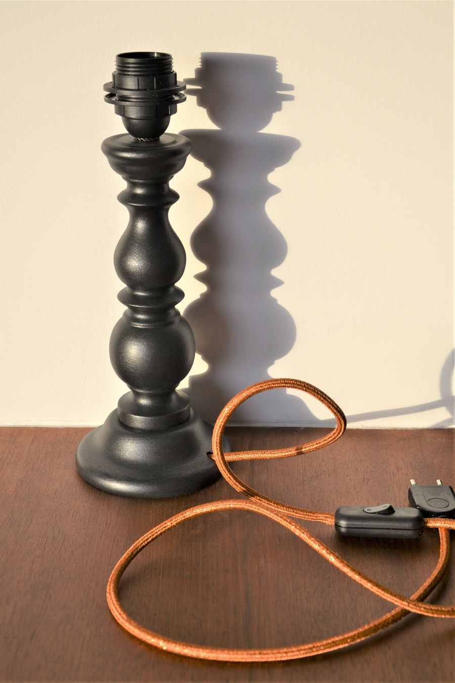 Large black wooden lamp foot turned