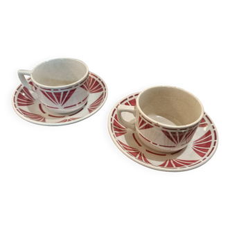 Set of two cups with saucers