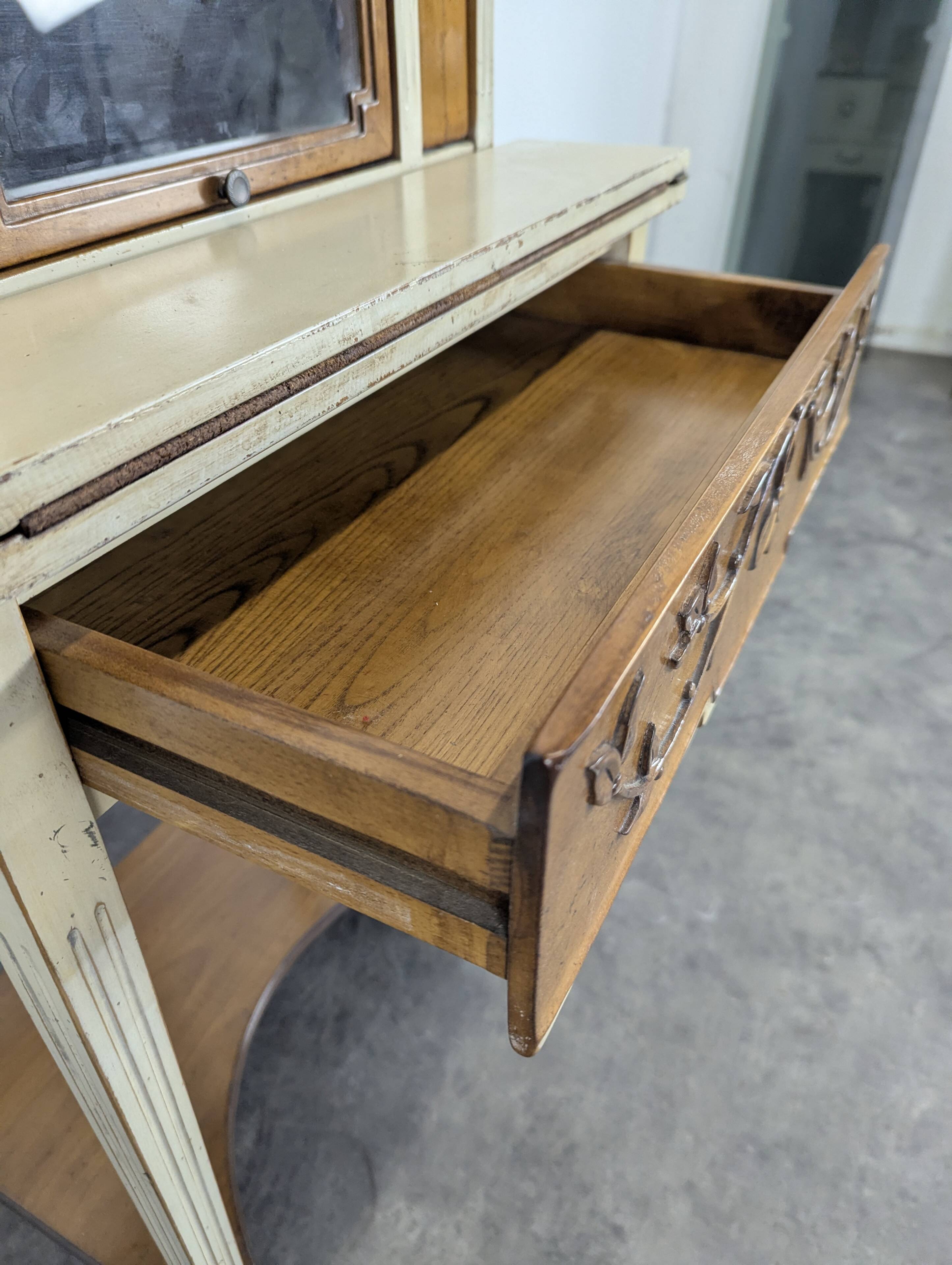 Lady Bonheur's desk, cerused and neo-rustic with highlights.