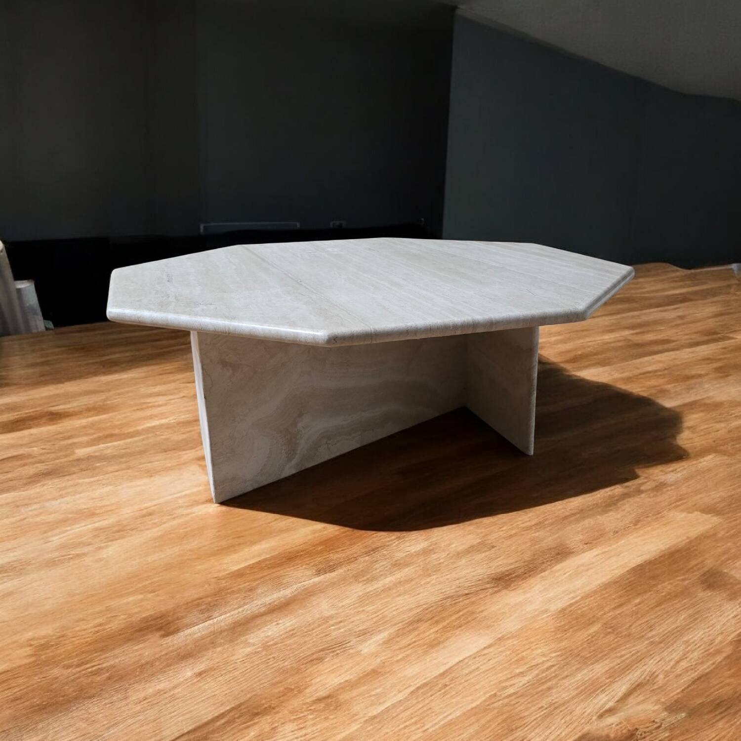 Octagonal coffee table in travertine