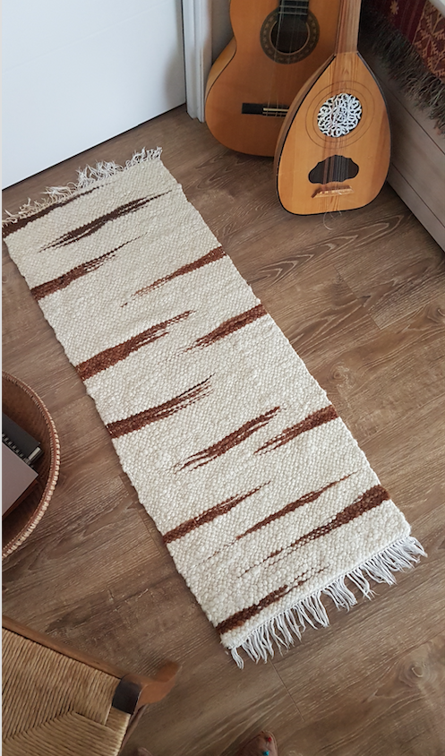 Vintage wool atisanal carpet