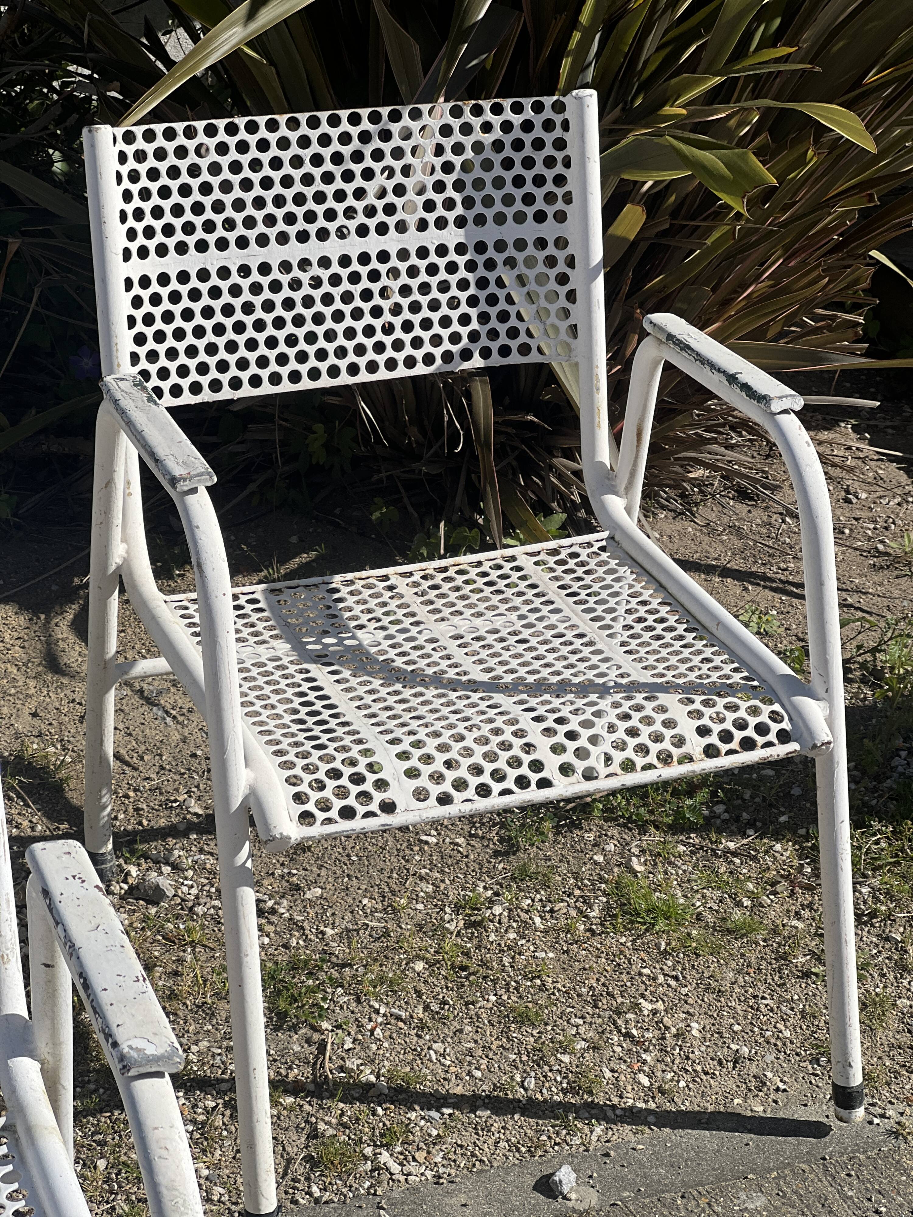 Set of 10 perforated metal garden chairs