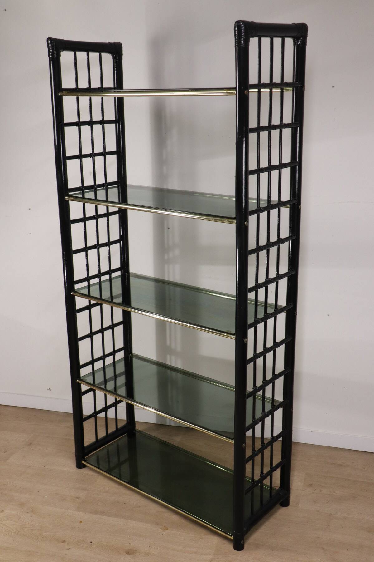 Vintage 1970s shelf in smoked glass with a bamboo-style structure.
