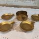 Set 5 pieces of 4 individual ashtrays in old brass