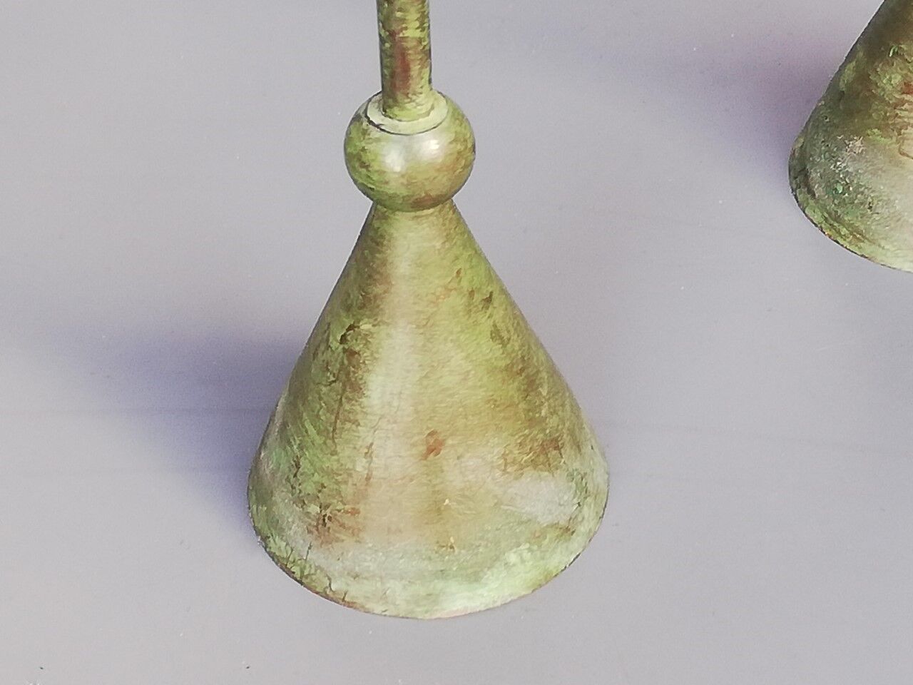 Pair of bronze patina metal candlesticks