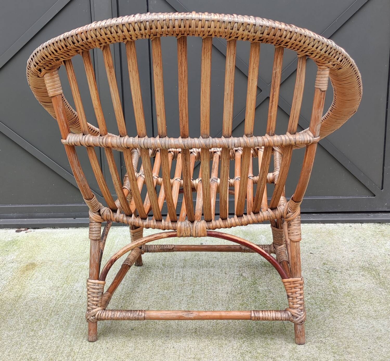 Vintage rattan shell basket armchair