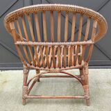 Vintage rattan shell basket armchair