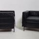 Pair of vintage armchairs Hugues Chevalier in leather 1980