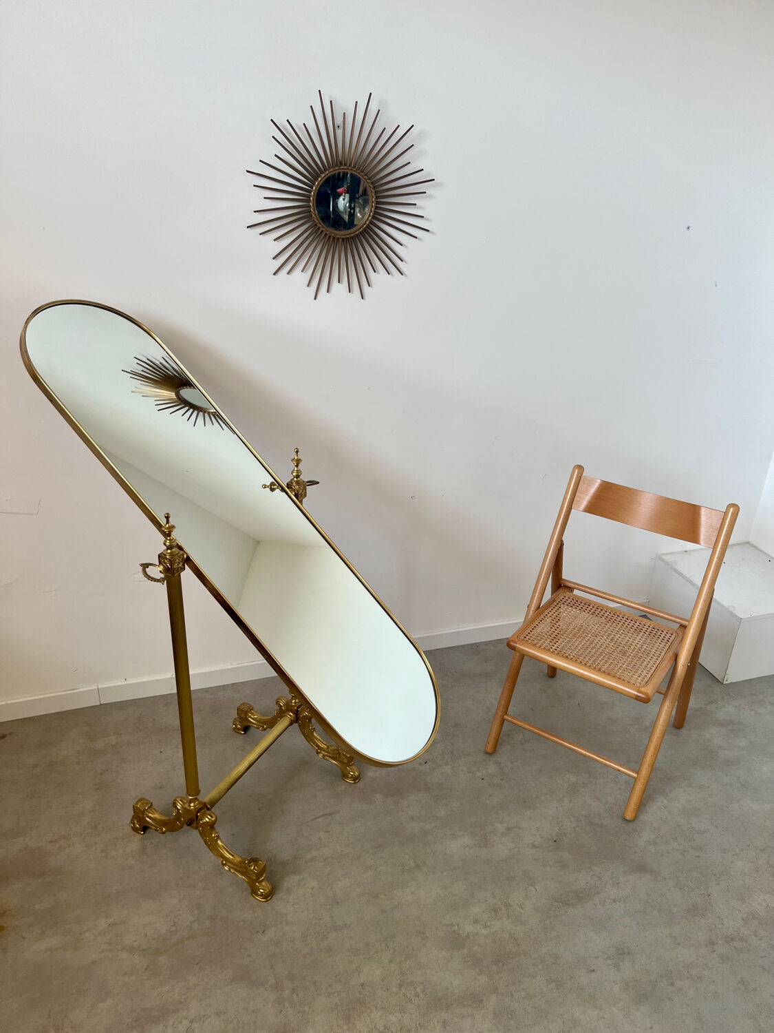 Old free-standing mirror in gilded brass in psychedelic neoclassical style Years 40 France