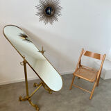 Old free-standing mirror in gilded brass in psychedelic neoclassical style Years 40 France