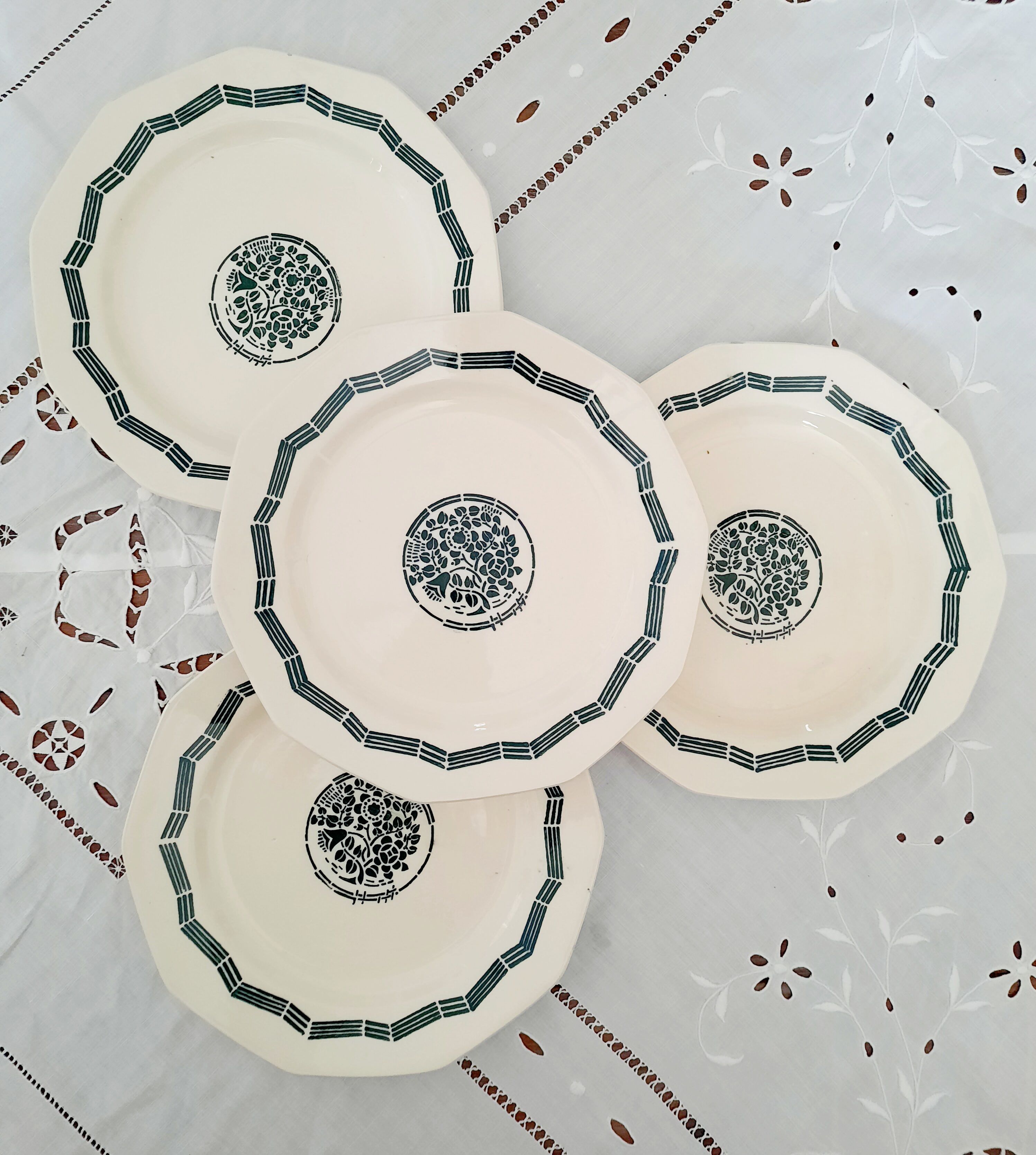 8 Dessert plates iron land