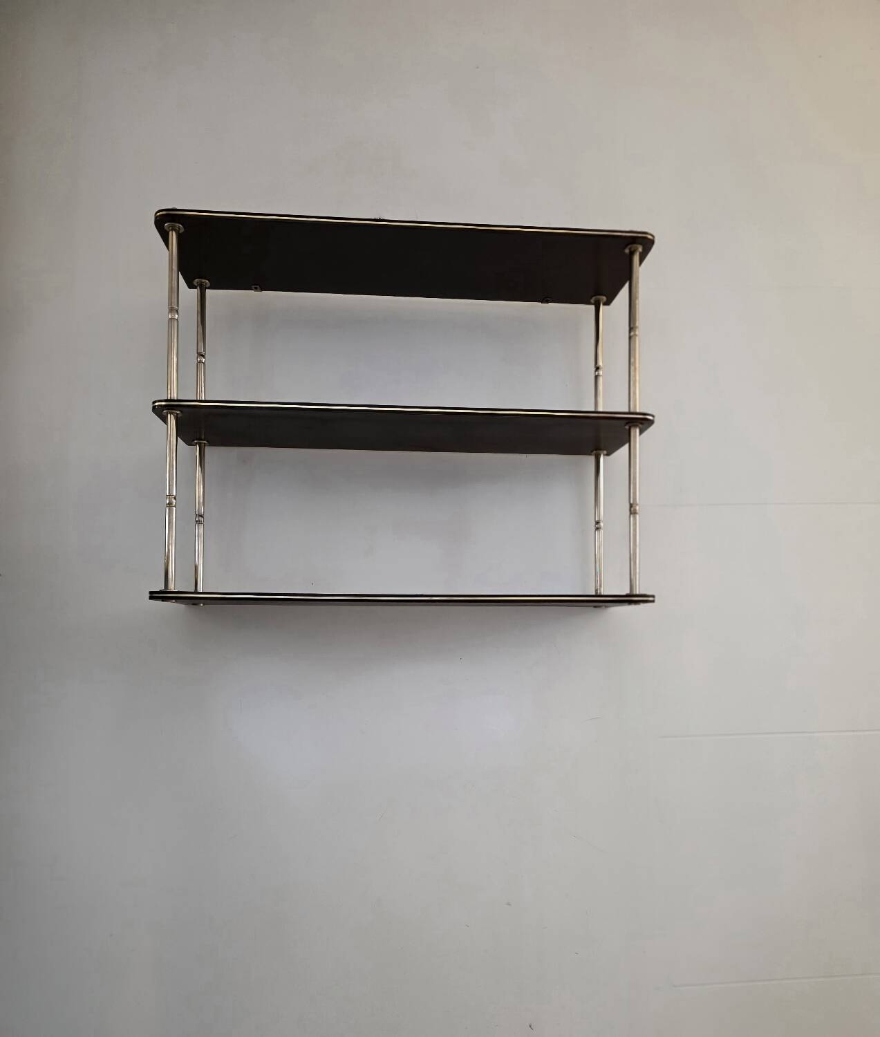 Wooden shelf with gold metal