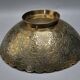 Engraved brass bowl from the mid-20th century with a scalloped edge.