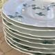 8 Haviland Limoges dinner plates.