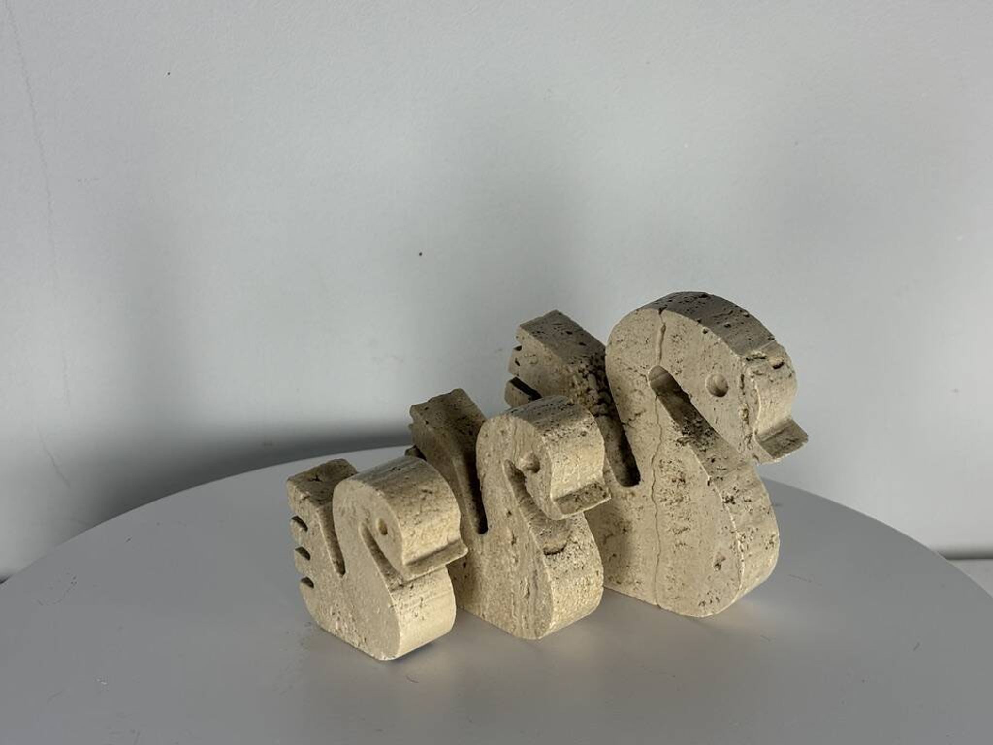 Swans Enzo Mari travertine for Fratelli Mannelli, Italy, 1970.