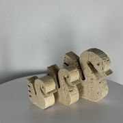 Swans Enzo Mari travertine for Fratelli Mannelli, Italy, 1970.