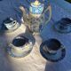Old coffee service Lunéville with blue lace decoration.